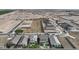 Aerial view of a new residential development showing modern homes and landscaping in the surrounding community at 24183 W Agora Ln, Buckeye, AZ 85326