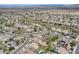 Expansive aerial view of a meticulously planned community with lush landscaping, pools and desert scapes at 29214 N 19Th Ln, Phoenix, AZ 85085