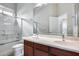 Bathroom featuring a double vanity sink and a shower and tub combo at 29214 N 19Th Ln, Phoenix, AZ 85085