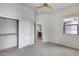 Cozy bedroom featuring neutral walls and carpet plus walk in closet at 29214 N 19Th Ln, Phoenix, AZ 85085