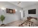 Entertaining game room with foosball table, mounted dartboard, and media center, great for recreation and relaxation at 29214 N 19Th Ln, Phoenix, AZ 85085