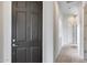 View of the front door and hallway with tile flooring at 29214 N 19Th Ln, Phoenix, AZ 85085