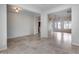 Bright and open living room with tile flooring and recessed lighting at 29214 N 19Th Ln, Phoenix, AZ 85085