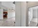 Open concept living space with tile flooring and a doorway leading to another room at 29214 N 19Th Ln, Phoenix, AZ 85085