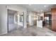 Spacious living room with tiled floors, recessed lighting, and an adjacent covered patio at 29214 N 19Th Ln, Phoenix, AZ 85085