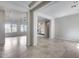 Open-concept living room featuring tile floors and recessed lighting at 29214 N 19Th Ln, Phoenix, AZ 85085
