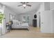 Bright and airy bedroom with vaulted ceilings, natural light, and wood-look flooring at 3349 E Flamingo Ct, Gilbert, AZ 85297