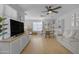 Bonus room with stylish furnishings, built-in shelves, and plenty of seating at 3349 E Flamingo Ct, Gilbert, AZ 85297