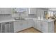 Kitchen with stainless steel dishwasher and a sink with view through the bright window at 3349 E Flamingo Ct, Gilbert, AZ 85297