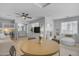 Bright living room features an open layout, built-in shelving, and modern ceiling fan at 3349 E Flamingo Ct, Gilbert, AZ 85297