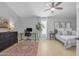 Bedroom with a work station, stylish furnishings, and natural light streaming through the windows at 3349 E Flamingo Ct, Gilbert, AZ 85297