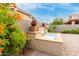 Beautiful backyard featuring a water feature, landscaped greenery, and pavers for an outdoor experience at 3637 E Ebano St, Gilbert, AZ 85295