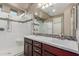 Double sink vanity and shower with mosaic accents in modern bathroom at 3637 E Ebano St, Gilbert, AZ 85295