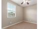 Neutral bedroom with plush carpet and window at 3637 E Ebano St, Gilbert, AZ 85295