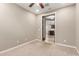 Bedroom with carpet and entry to kitchen at 3637 E Ebano St, Gilbert, AZ 85295