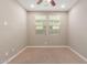 Spacious bedroom with carpet and windows at 3637 E Ebano St, Gilbert, AZ 85295