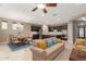 Open-concept living area features a spacious layout with dining area and modern kitchen, great for entertaining at 3637 E Ebano St, Gilbert, AZ 85295