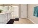 Bright bathroom featuring a glass-enclosed shower and sleek vanity with double sinks at 3914 S 58Th Ln, Phoenix, AZ 85043
