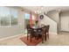 Dining room with large sliding glass door providing outdoor views and sunlight at 3914 S 58Th Ln, Phoenix, AZ 85043