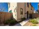 Charming two-story home with desert landscaping and a welcoming walkway to the front door at 3914 S 58Th Ln, Phoenix, AZ 85043