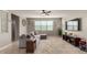 Spacious living room with large sectional sofa, ceiling fan and view at 3914 S 58Th Ln, Phoenix, AZ 85043