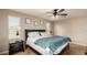 Bright main bedroom with a ceiling fan and carpeted floor at 3914 S 58Th Ln, Phoenix, AZ 85043