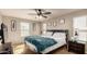 Comfortable main bedroom boasts a ceiling fan and cozy interior at 3914 S 58Th Ln, Phoenix, AZ 85043