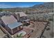 Scenic desert home featuring a covered patio, custom BBQ area, spiral staircase and mountain views at 4016 E Western Star Blvd, Phoenix, AZ 85044