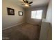Neutral-toned bedroom with carpet flooring, featuring a window and built-in storage, offering a peaceful retreat at 4016 E Western Star Blvd, Phoenix, AZ 85044