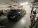 Garage featuring new model car, ample storage and bike racks at 4016 E Western Star Blvd, Phoenix, AZ 85044