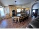 Open kitchen with a spacious island, black countertops, and stainless steel appliances at 4016 E Western Star Blvd, Phoenix, AZ 85044