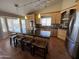Modern kitchen with stainless steel appliances, granite countertops, a large island, and lots of counter seating at 4016 E Western Star Blvd, Phoenix, AZ 85044