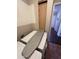 New laundry machines with ironing board and upper cabinet storage at 4016 E Western Star Blvd, Phoenix, AZ 85044