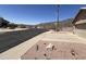 Street view of the home showing the corner lot and native landscaping at 4016 E Western Star Blvd, Phoenix, AZ 85044