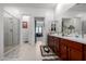 Bathroom features a double sink vanity with tile floors, shower and walk-in closet at 4044 E Dawson E Dr, Chandler, AZ 85249