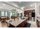 Gourmet kitchen with granite countertops, stainless steel appliances, and seamless flow into the living spaces at 4044 E Dawson E Dr, Chandler, AZ 85249