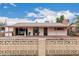 Charming single-story home with brick and gravel landscaping offering privacy and curb appeal at 4144 N 29Th Ave, Phoenix, AZ 85017