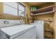 Laundry room with washer, dryer, shelving and window at 4144 N 29Th Ave, Phoenix, AZ 85017