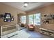 Decorated bedroom with a crib and a large window overlooking a scenic view at 4349 W Cielo Grande --, Glendale, AZ 85310