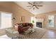 Comfortable living room features a fireplace and stylish decor at 4349 W Cielo Grande --, Glendale, AZ 85310