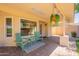Charming covered patio with seating, complete with stylish outdoor decor and a tranquil setting at 4349 W Cielo Grande --, Glendale, AZ 85310