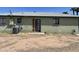 Back of the property showing the exterior of the home and yard at 4410 N 50Th Dr, Phoenix, AZ 85031