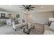 Open living area with seamless flow to the kitchen and dining areas at 4509 E La Puente Ave, Phoenix, AZ 85044
