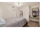 Bedroom with a ceiling fan and a window-nook workstation at 5445 E Mckellips Rd # 23, Mesa, AZ 85215