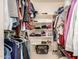 Organized closet with clothing racks and shelves filled with personal items at 5445 E Mckellips Rd # 23, Mesa, AZ 85215