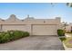 Southwestern home featuring attached garages, desert landscaping, neutral paint, and bronco artistic desert detail at 5445 E Mckellips Rd # 23, Mesa, AZ 85215