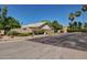 Community entrance with prominent signage and lush landscaping at 5445 E Mckellips Rd # 23, Mesa, AZ 85215