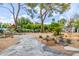 Spacious backyard with walking trail, native landscaping and picnic area at 6112 E Jenan Dr, Scottsdale, AZ 85254