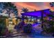 Beautiful backyard with outdoor cabana, pool, and desert landscape at 6112 E Jenan Dr, Scottsdale, AZ 85254