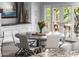 Bright and airy dining area with view to patio, ideal for Gathering meals and entertaining at 6112 E Jenan Dr, Scottsdale, AZ 85254